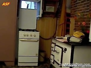 Eager housewife riding a dog's cock like a whore